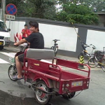 Olympic Pedicab fella pulling Brad Blanks around Beijing